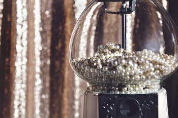 Close-up Photography of Clear Glass Candy Dispenser