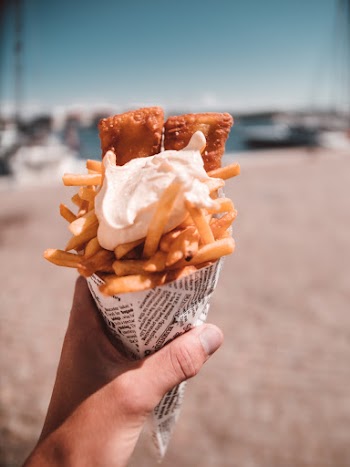Close-up Photography of French Fries With Cream