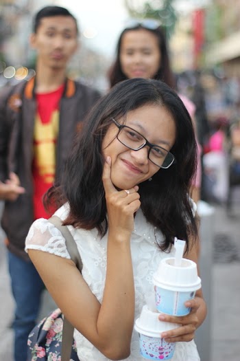 Close-Up Photography of Girl Wearing Eyeglasses