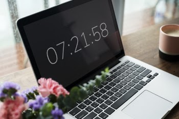 Close-Up Photography of MacBook near Flowers