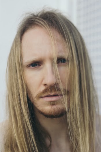 Close-up Photography of Man's Face