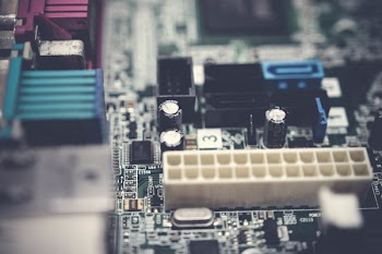 Close-Up Photography of Motherboard Capacitors