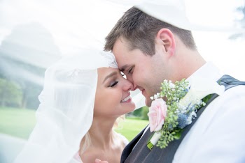 Close-up Photography Of Newly Wed Couple