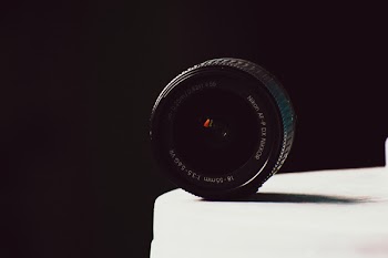 Close-Up Photography of Nikon Camera Lens