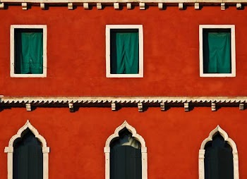 close-up photography of orange concrete building