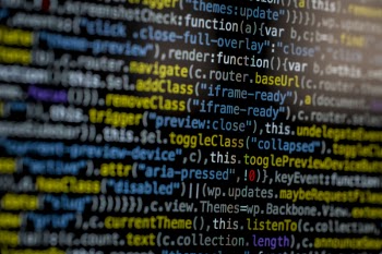 Close-Up Photography of Program Codes