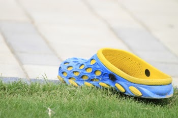 Close-up Photography of Rubber Clog
