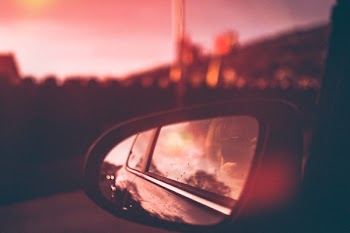 Close-Up Photography of Side Mirror During Dawn