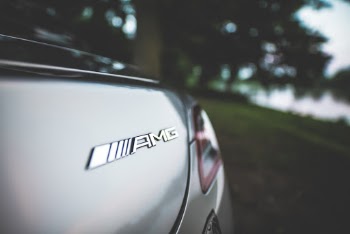 Close-up Photography Of Silver Mercedes Benz Vehicle