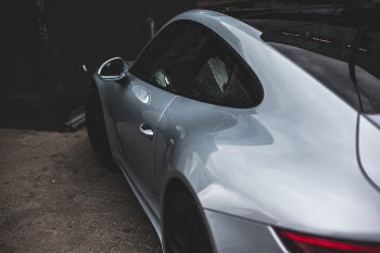 Close-Up Photography of Silver Sports Car