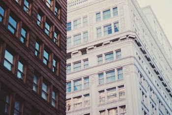 Close-up Photography of White and Brown Building