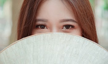 Close-up Photography of Woman's Eyes
