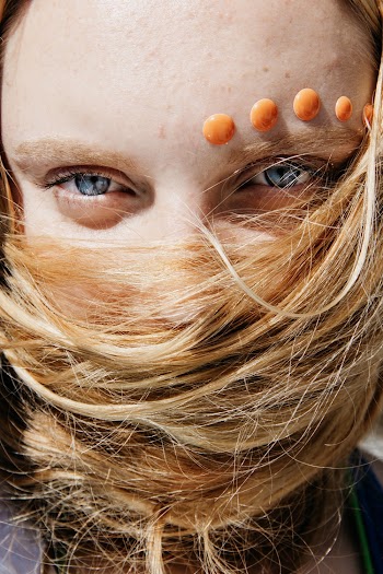 Close-up Photography of Woman Covering Her Face With Her Hair