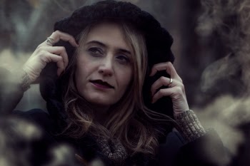 Close-up Photography of Woman Wearing Black Hooded Jacket