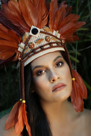 Close-Up Photography of Woman Wearing Feather Headdress