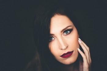 Close-up Photography of Woman Wearing Lipstick