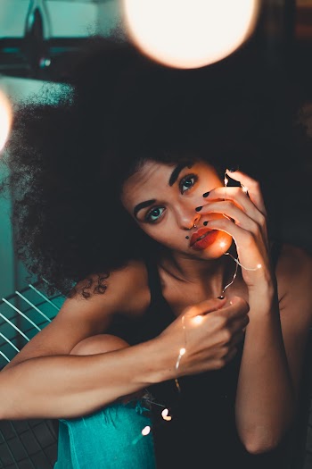 Close-up Photography of Woman Wearing Tank Top