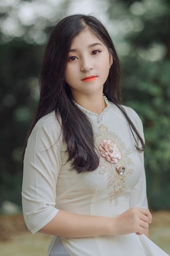 Close-Up Photography of Woman Wearing White Dress