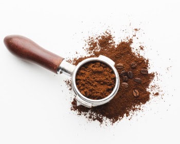 Close-up portafilter with coffee Free Photo