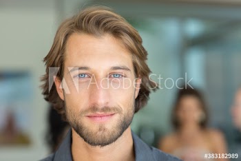 Close up portrait handsome young man with beard