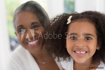 Close up portrait happy grandmother and granddaughter