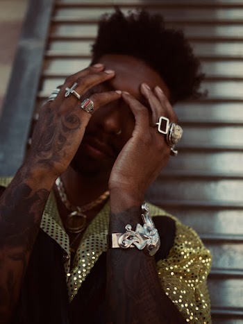 Close-up Portrait Photo of Man Covering His Face With His Hands