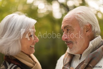 Close up senior couple face to face