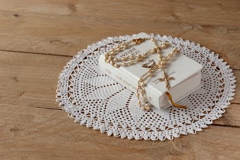 Close-up View of Bible And Rosary
