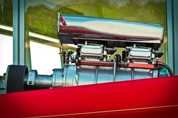 Close-up View of Red And Silver Engine