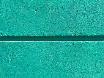 close view of teal color wall