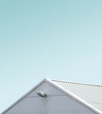 close view of white painted shed