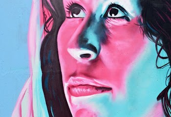 close view of woman's face painting