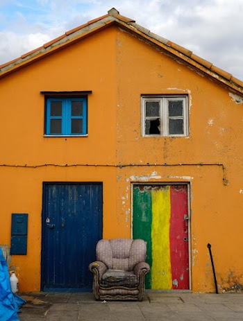 Closed Blue and Multicolored Wooden Doors