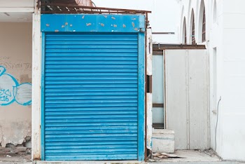 Closed Blue Metal Roll-up Door