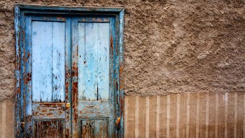 closed blue wooden door