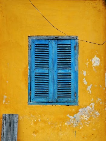 closed blue wooden window