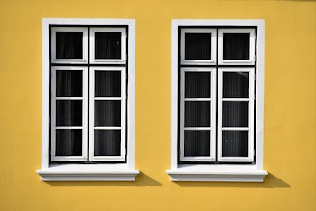 Closed White Wooden Framed Glass Windows
