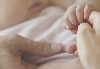 Closeup of baby holding mother | Free Photo - rawpixel