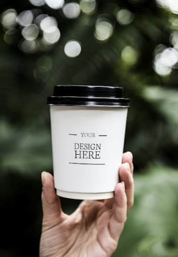Closeup of hand holding paper | Free PSD Mockup - rawpixel