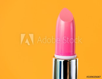 Closeup of pink lipstick for women