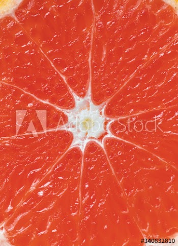 Closeup of red citrus blood orange textured background