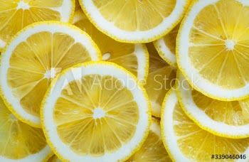 Closeup of slices of lemon textured background