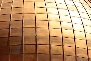 closeup photo of brass-colored wall