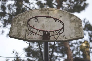 Closeup Photo of Gray, Red, and Black Basketball Hoop