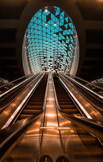 Closeup Photo of Lighted Escalator