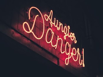 closeup photo of lighted signage