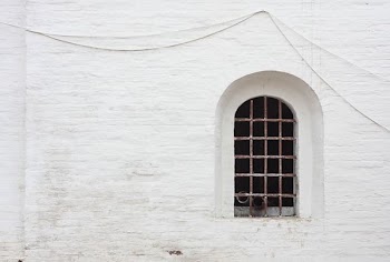 closeup photo of metal window