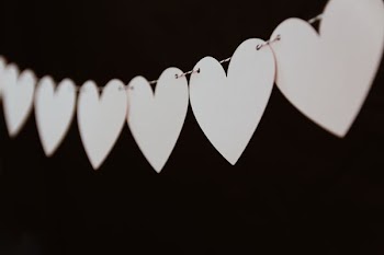 closeup photo of white heart bunting
