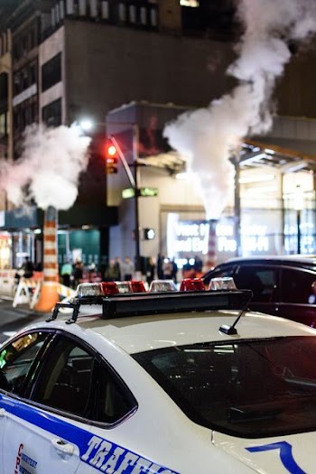 closeup photo of white police car