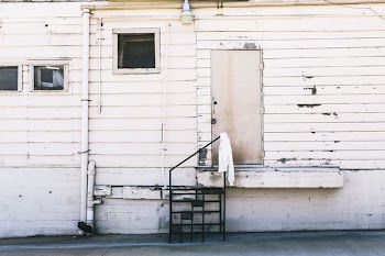 closeup photo of white wooden door